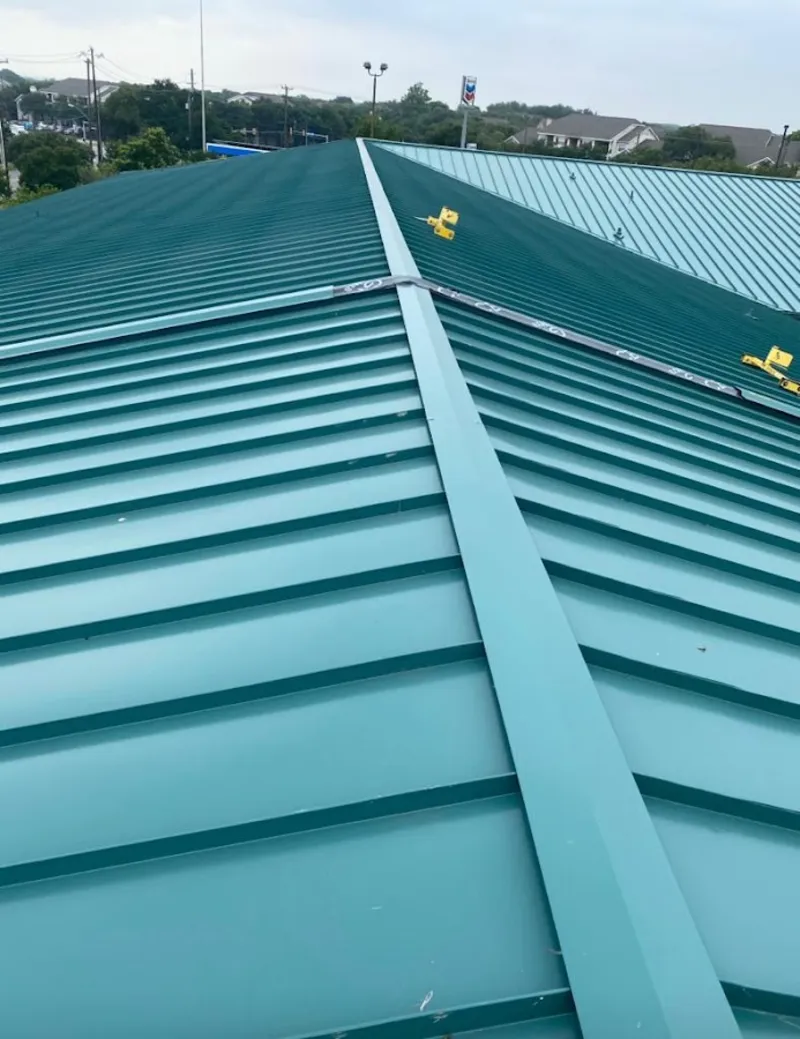 Green commercial metal roof ridge and valley for Metal Roof Repair in Ramona