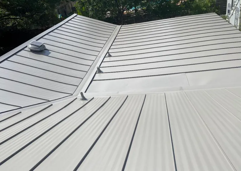 Solar attic fan installed on a metal roof for Roof Ventilation in Ramona
